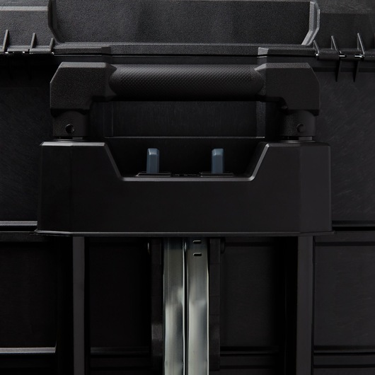 STANLEY 020800R black tool box handle and telescopic metal rails, close-up photography.