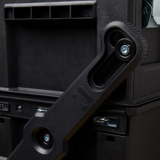 STANLEY SKU 020800R photography of black toolbox with close-up of locking mechanism and handle.