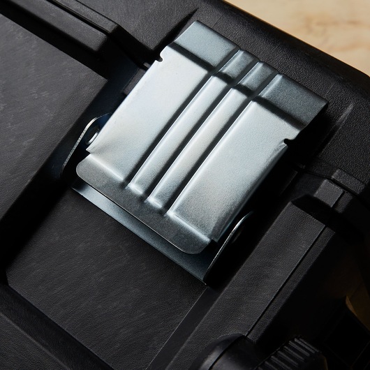 STANLEY 020800R latch detail on black toolbox, close-up photography showing metal clasp.