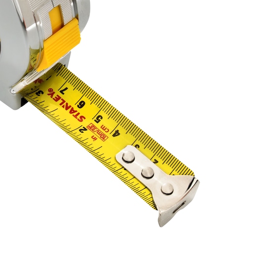 STANLEY 33-463 tape measure with yellow blade and metal tip, shown extended on white background, photography of product.