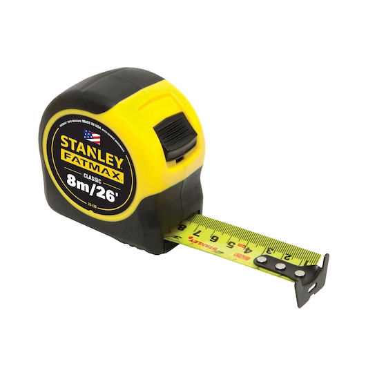 Stanley FatMax 8m/26ft tape measure in yellow and black, front angle on white background