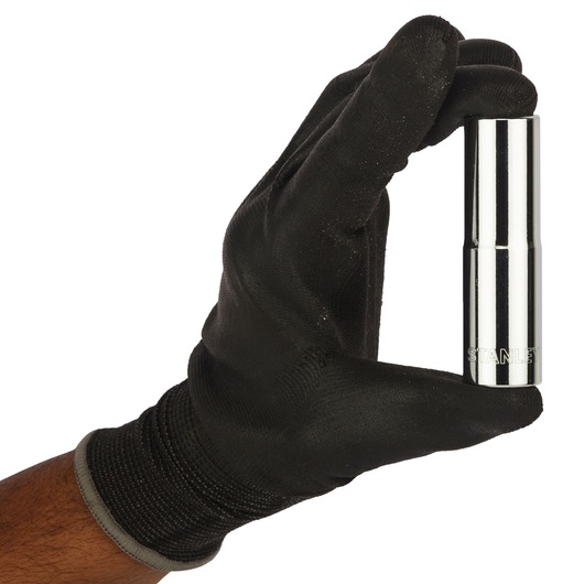 Photo of STANLEY 4-86-424 chrome socket held by a hand in a black glove, side angle.
