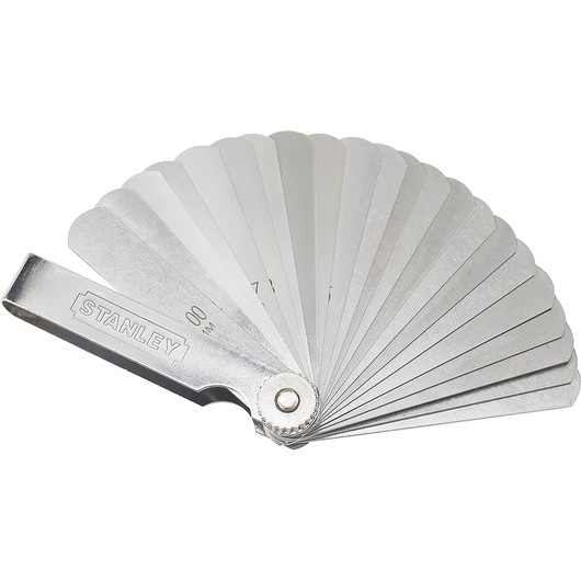 Photo of STANLEY feeler gauge SKU 78-212, fan layout, silver metal blades, top view on white background.