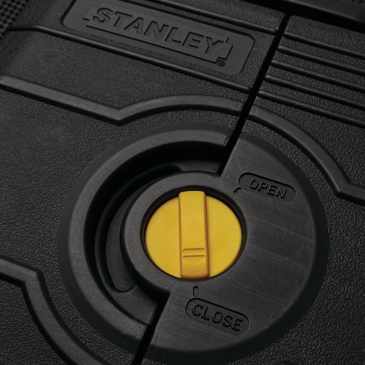 STANLEY 97-543 tool case close-up showing yellow twist lock and textured black plastic surface.