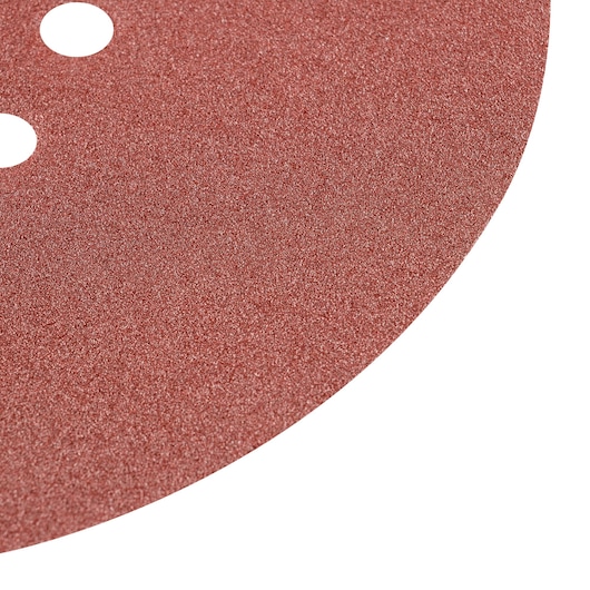STANLEY STA0120WS round sandpaper disc close-up, reddish-brown grit texture, two visible holes, top view.