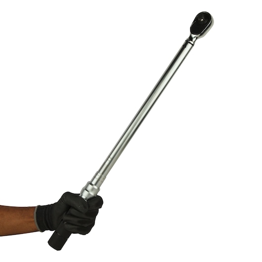 STANLEY STMT73591-8 torque wrench held at side angle, chrome finish, black handle, tool category.